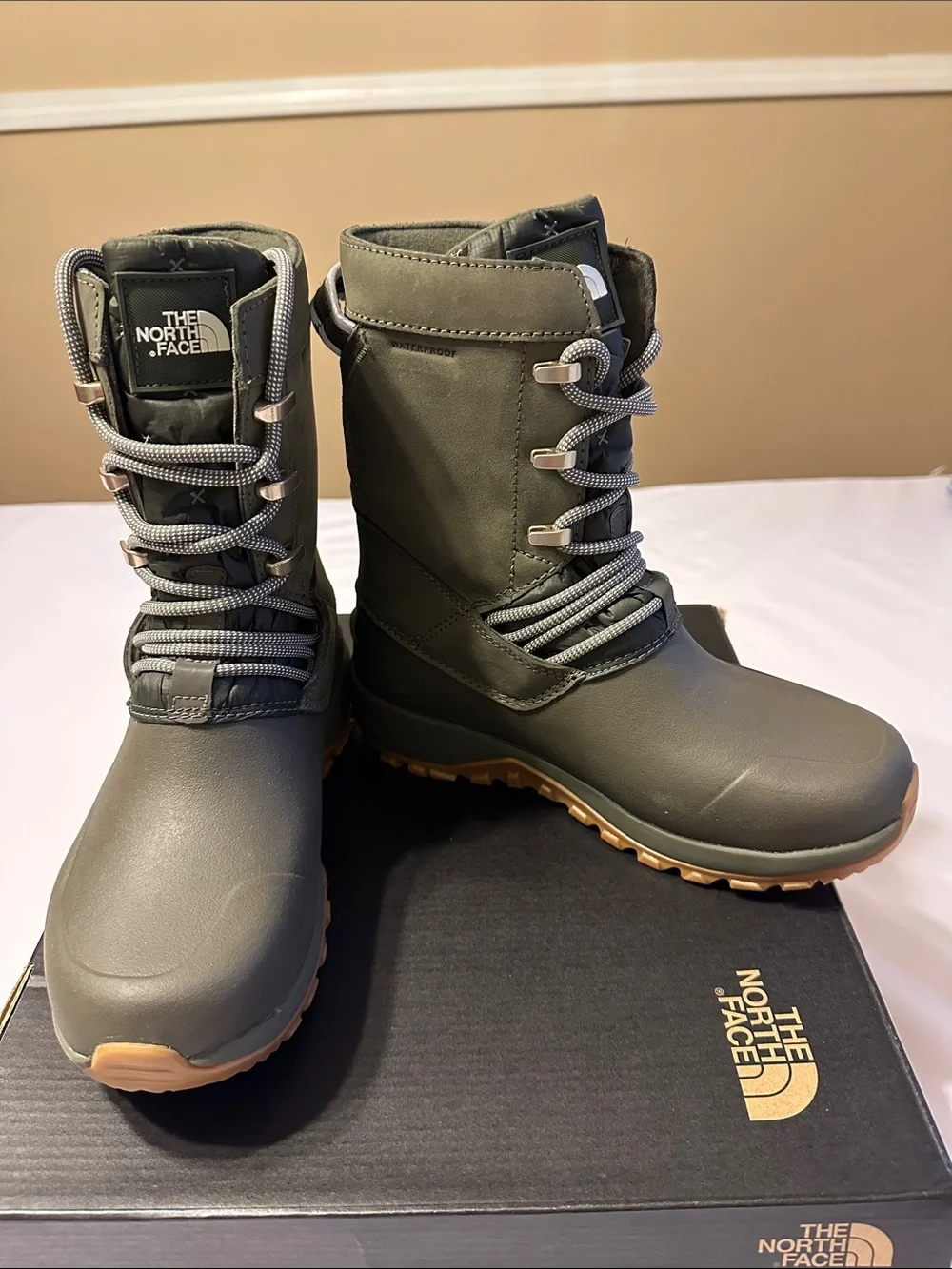 The North Face Women's Taupe/Green Insulated Winter Boots with Tan Outsoles .